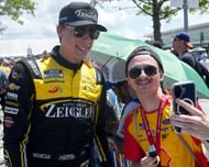 Carson Hocevar with NASCAR fans before the Brickyard 400 at Indianapolis. Source: Imagn